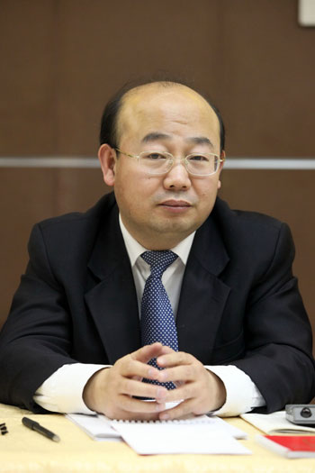 Луань Цзяньчжан, заместитель директора Департамента аналитики Международного Отдела ЦК КПК